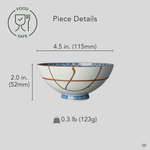 Size reference for a food-safe kintsugi Kyoto ware rice bowl in white porcelain restored with natural urushi and 24K gold: 4.5 in. wide, 2.0 in. tall, 0.3 lb.