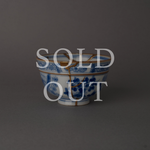 Sold out: 24K gold kintsugi Ko-Imari sometsuke cup with gold seams across blue-and-white porcelain, restored with natural urushi lacquer.