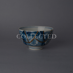 Ko-Imari sake cup in blue and white sometsuke porcelain with 24K gold kintsugi seams arcing down from the rim, restored with natural urushi in Japan. Sold out.