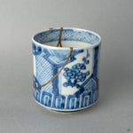 Close-up of the exterior glaze texture, where the fine kintsugi lines run like rivers, honoring history with every seam.