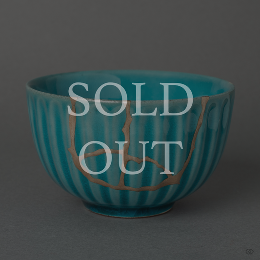 Handcrafted Gintsugi art piece with silver accents, labeled sold out.