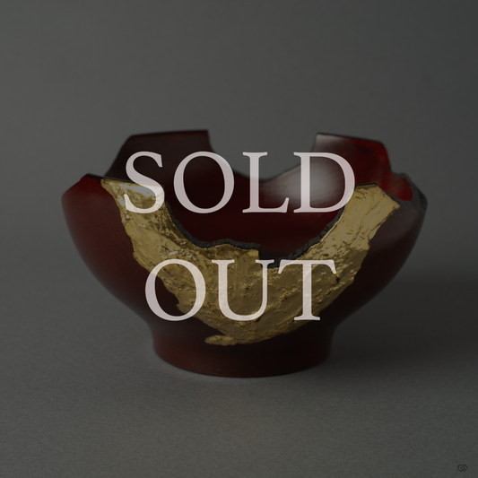 Sold: A Japanese lacquerware piece inspired by the Kintsugi philosophy, featuring elegant gold leaf decoration that celebrates the beauty of form.