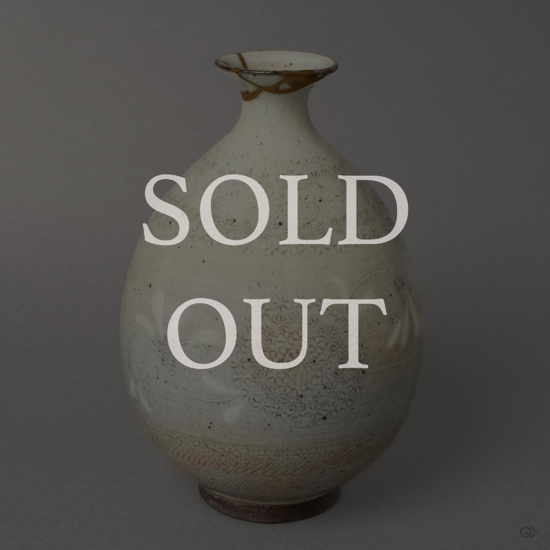 This sold-out piece of Japanese Kintsugi art features a Kyoto ware pottery tokkuri (sake bottle). A prime example of wabi-sabi philosophy, the broken ceramic is mended with gold, creating a unique and valuable object.