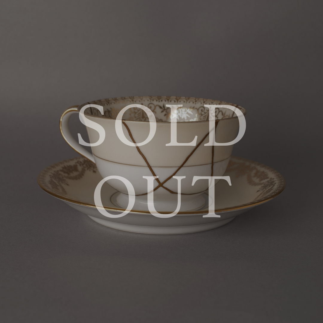 Sold out — An Early Noritake cup and saucer with Art Deco floral designs, restored with authentic 24K gold kintsugi and natural urushi lacquer. This one-of-a-kind piece by The Kintsugi Labo JAPAN has found its home.