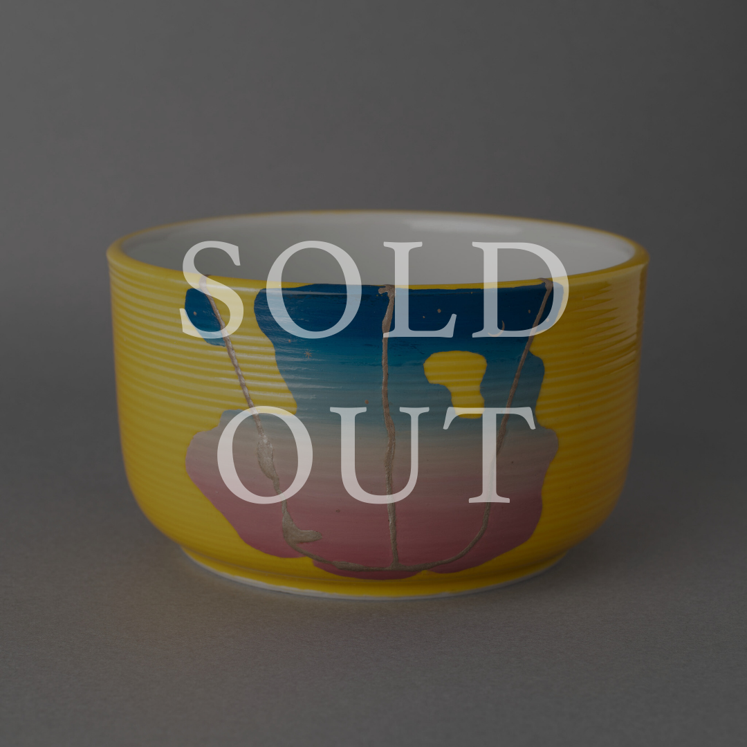 Sold out — A Kyoto ware matcha bowl restored with silver kintsugi and colored urushi lacquer, featuring layered glazes beneath quiet silver seams. This one-of-a-kind piece by The Kintsugi Labo JAPAN has found its home.