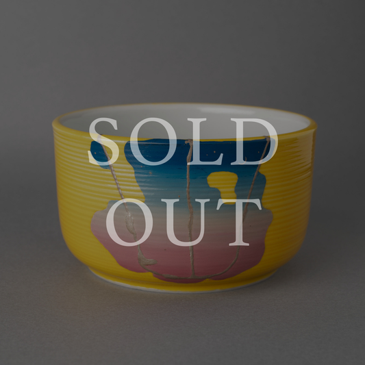 Sold out — A Kyoto ware matcha bowl restored with silver kintsugi and colored urushi lacquer, featuring layered glazes beneath quiet silver seams. This one-of-a-kind piece by The Kintsugi Labo JAPAN has found its home.