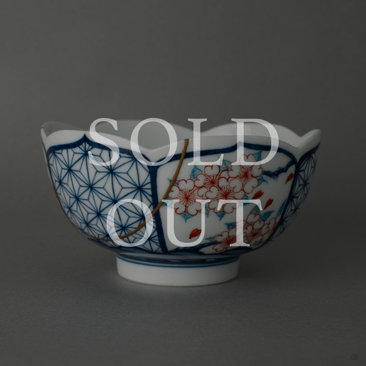 Sold out — A Nabeshima ware matcha bowl restored with authentic 24K gold kintsugi and natural urushi lacquer, featuring hand-painted floral porcelain from one of Japan's most celebrated pottery traditions. This one-of-a-kind food-safe piece by The Kintsugi Labo JAPAN has found its home.