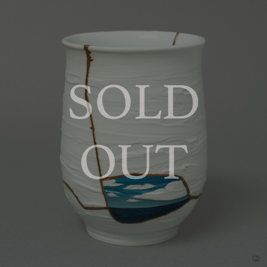 Sold-out-kintsugi tea cup pottery of nabeshima ware restored with urushi lacquer and pure gold.