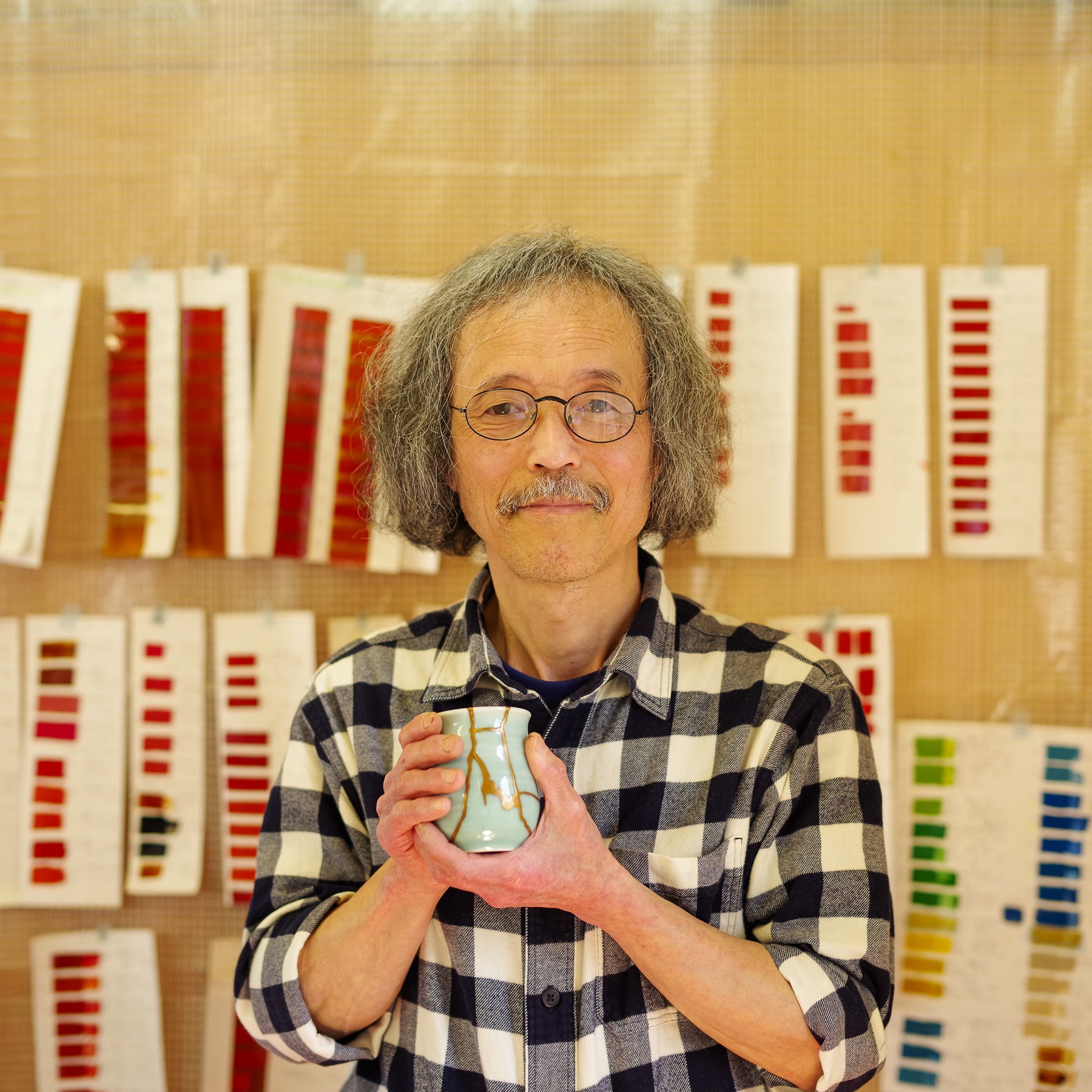 Portrait of Seisaku Nakajima, master of traditional urushi lacquer and kintsugi restoration, based in Hikone, Japan.
