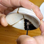 Skill making a stunning kintsugi pottery